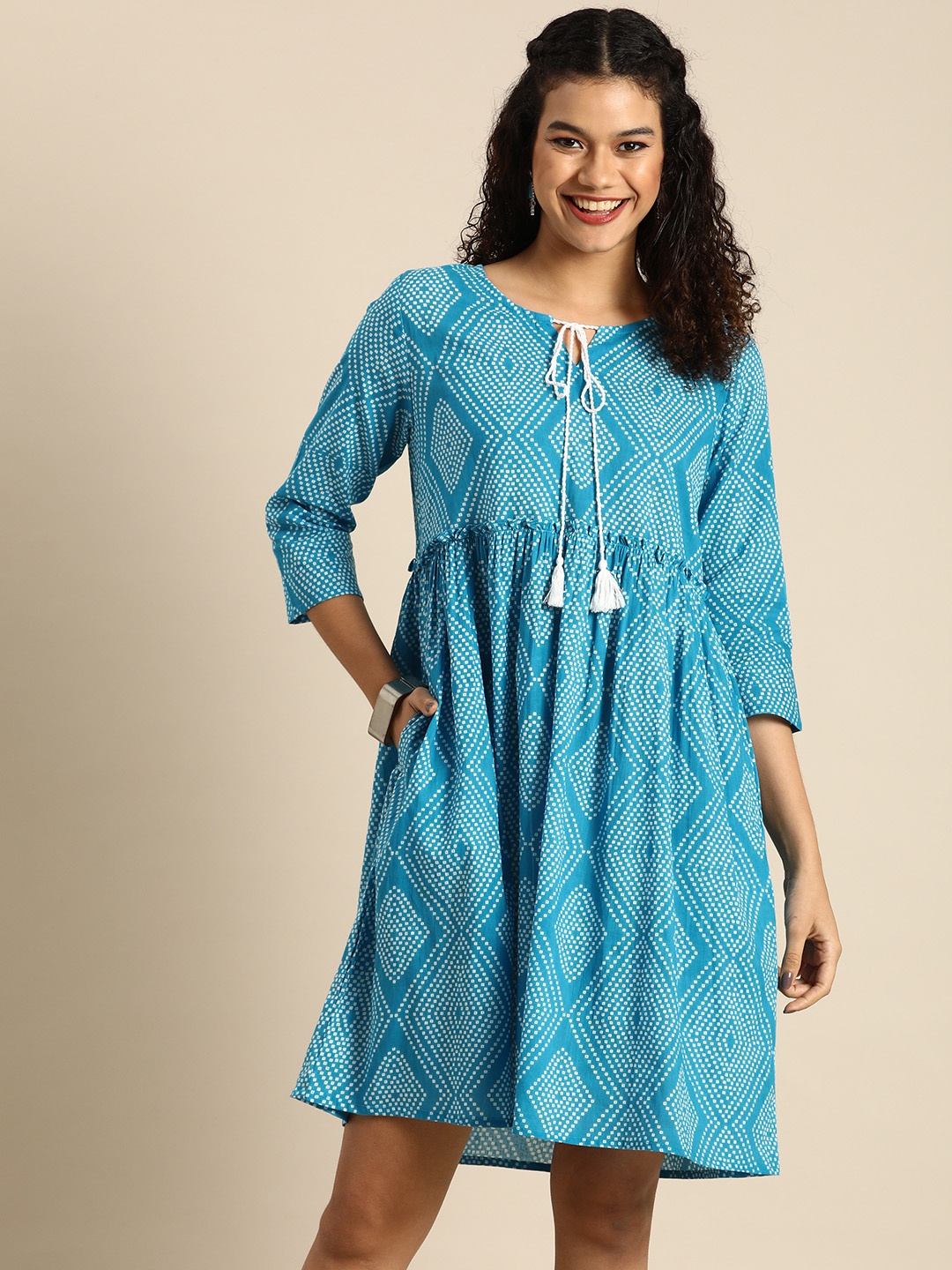 

Anouk Blue & White Bandhani Printed Tie-Up Neck Fit And Flare Ethnic Dress