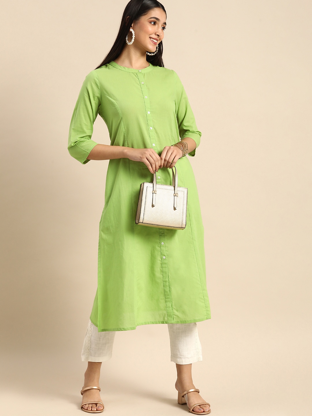 

Anouk Women Green Solid Pure Cotton Kurta