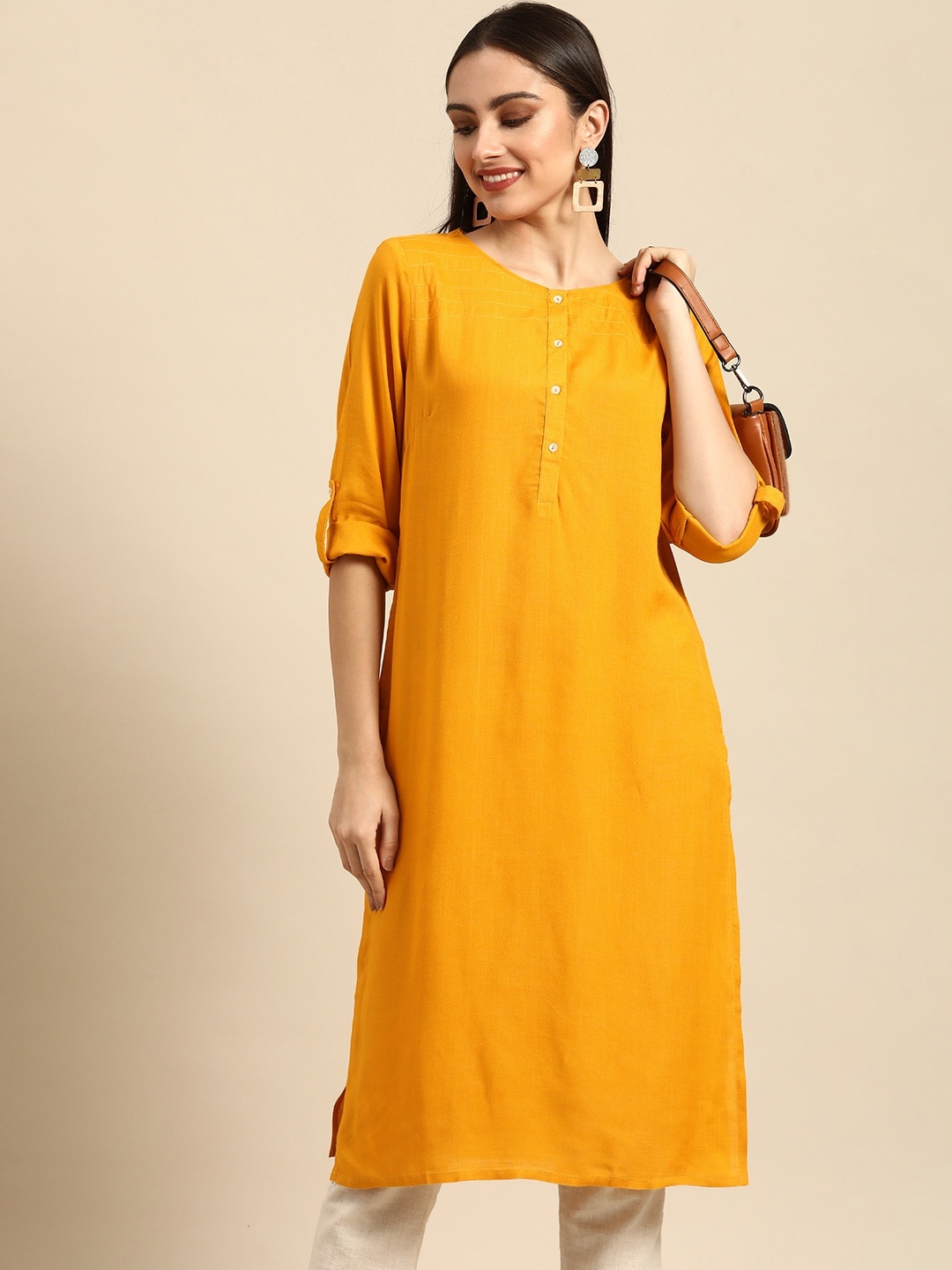 

Anouk Women Mustard Yellow Solid Round-Neck A-Line Kurta