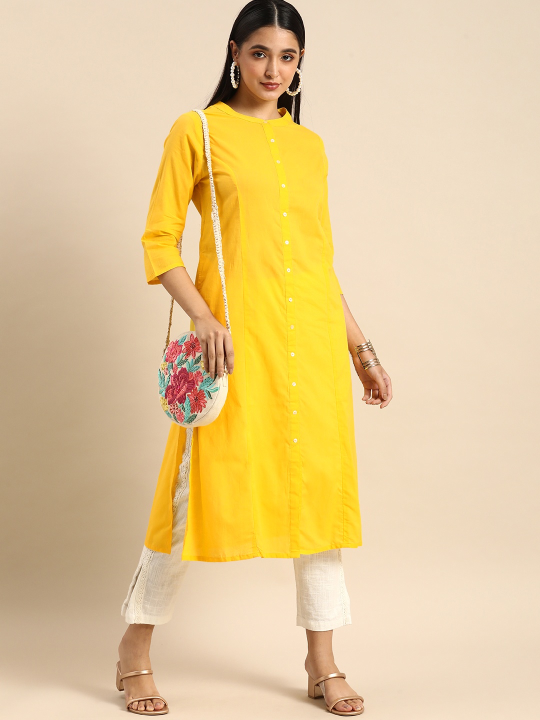 

Anouk Women Yellow Solid Pure Cotton Kurta