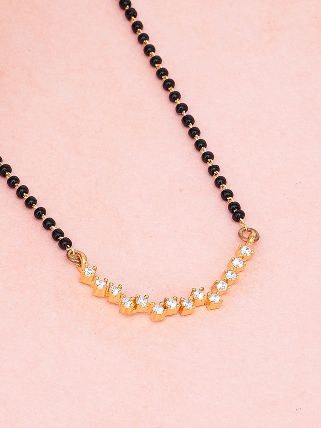 

KUNUZ Gold-Plated White Stone-Studded Black Beaded Mangalsutra