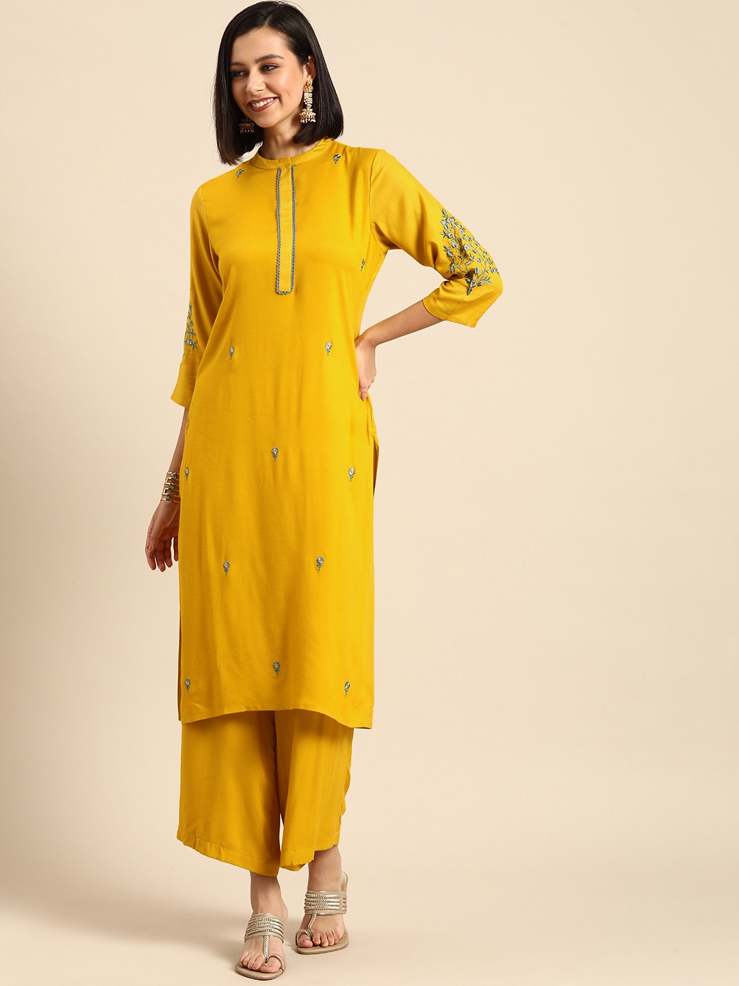 

Anouk Women Mustard Yellow Floral Embroidered Kurta with Palazzos