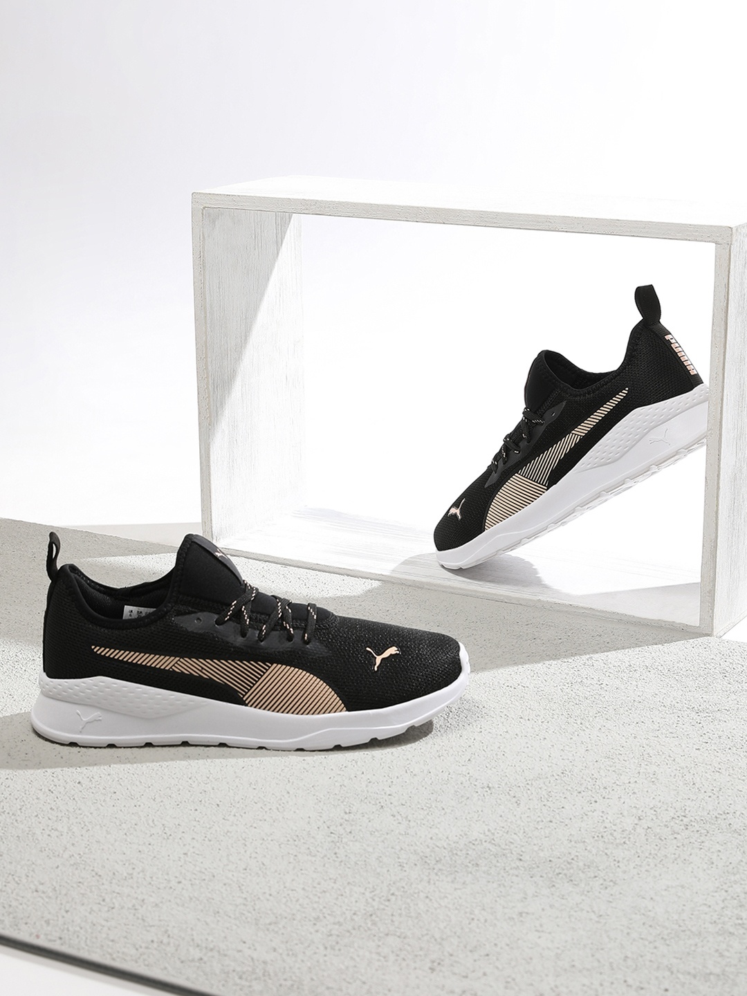 

Puma Women Black Sneakers