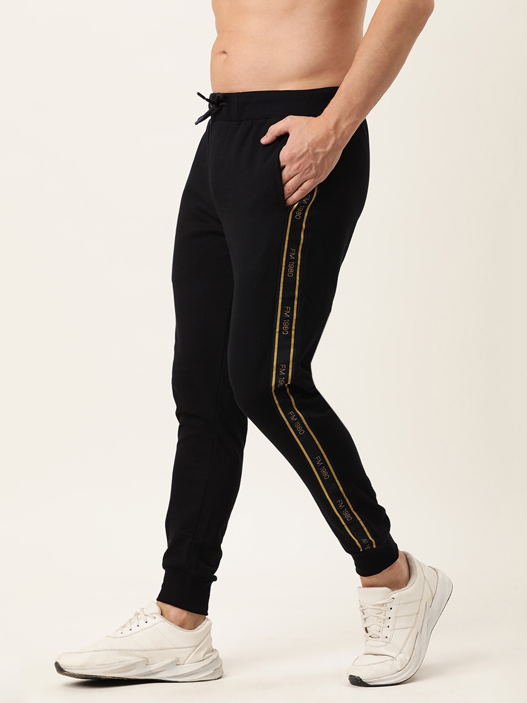 

Flying Machine Men Black Solid Joggers with Side Taping Detail