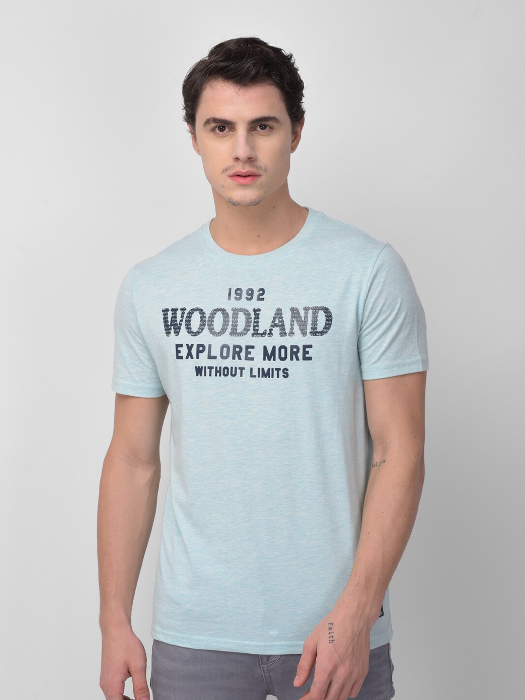

Woodland Men Turquoise Blue & Black Typography Printed T-shirt