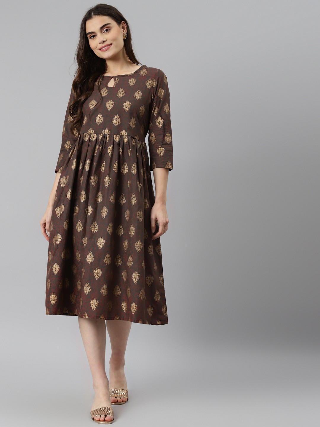 

DESI BEATS Brown & Golden Pure Cotton Ethnic Motifs A-Line Ethnic Dress
