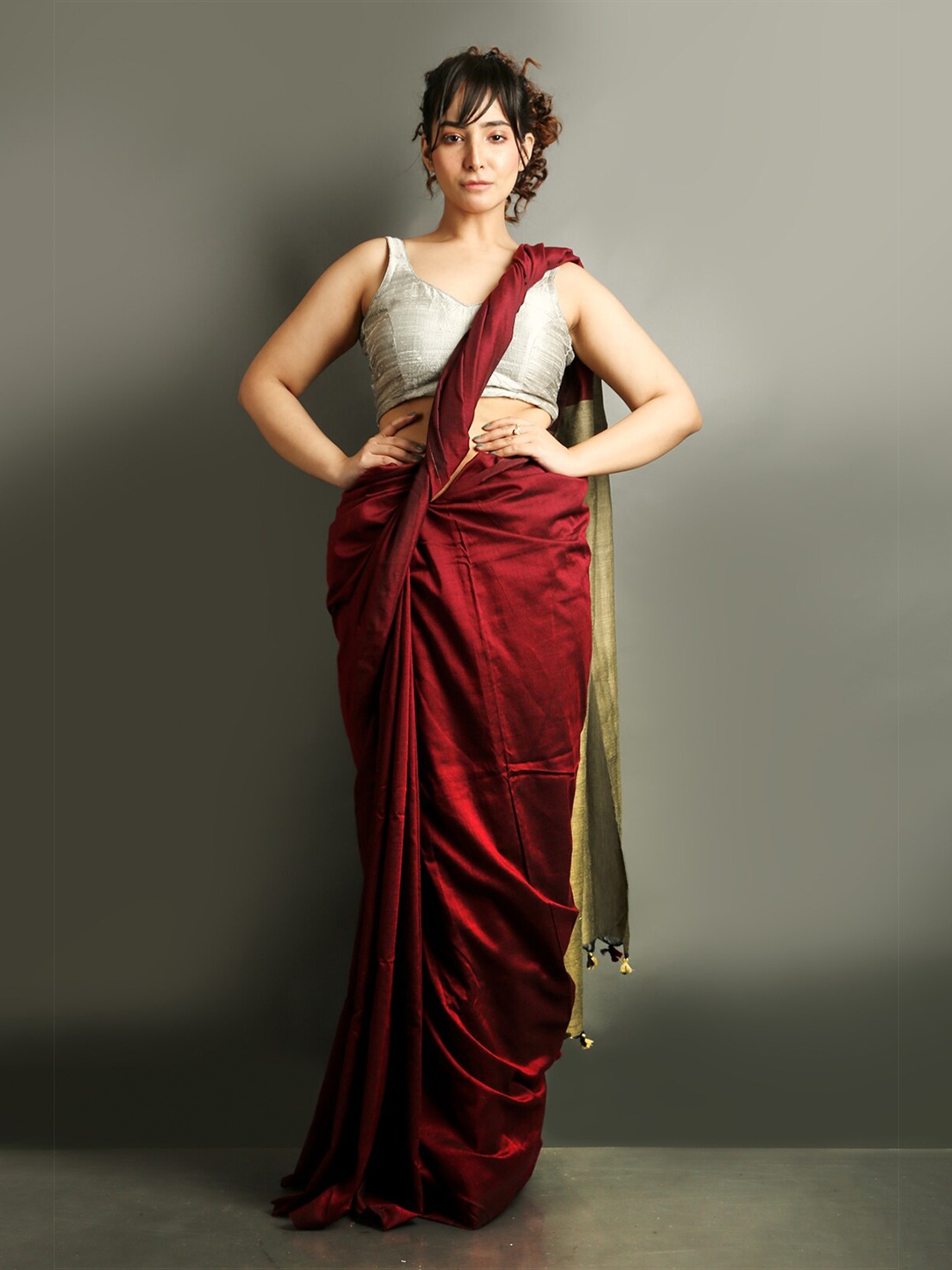 

Charukriti Maroon & Beige Cotton Blend Saree