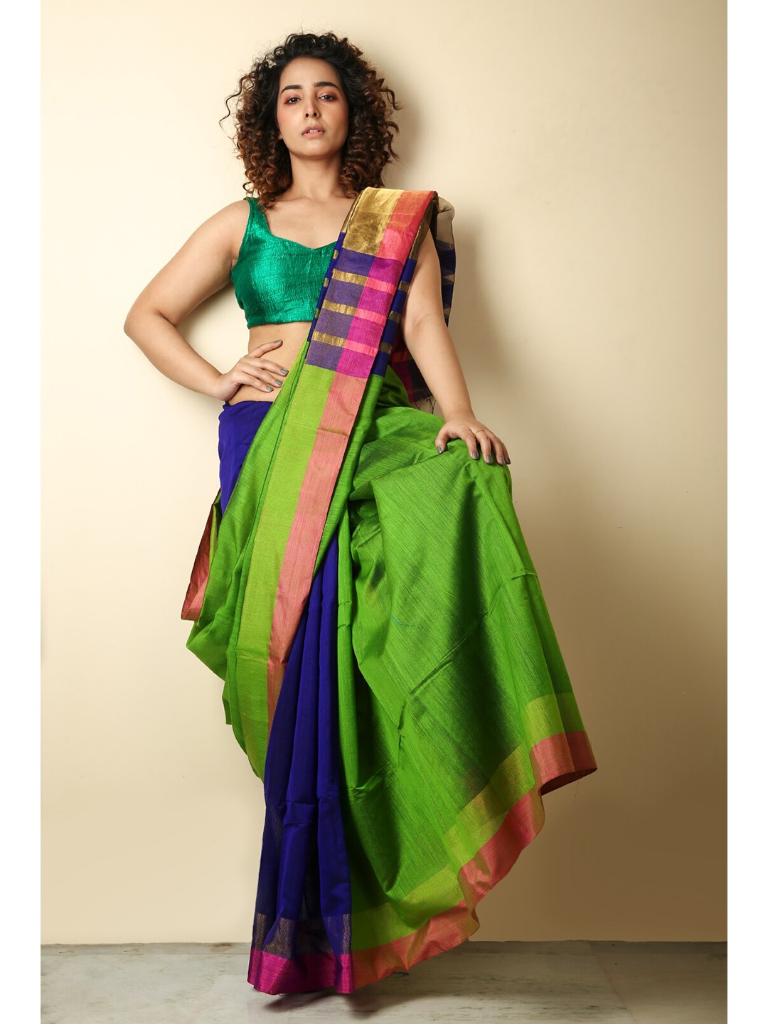 

Charukriti Green & Navy Blue Woven Striped Saree