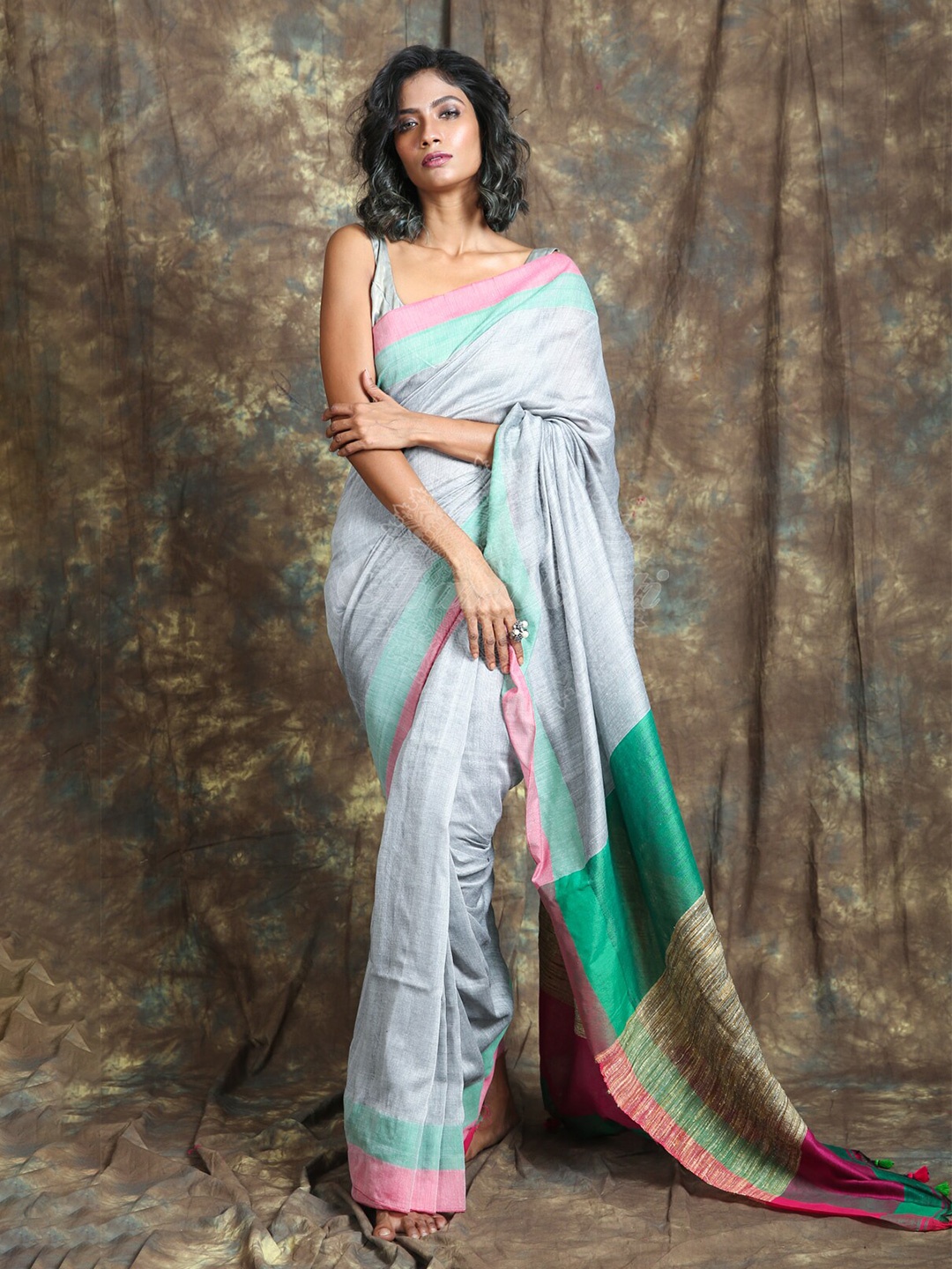 

Charukriti Silver & Green Cotton Handloom Saree