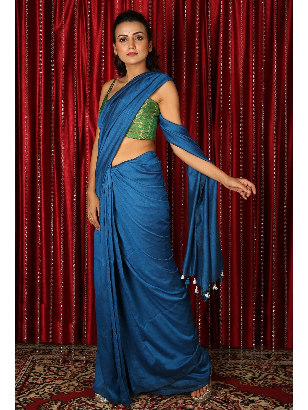 

Charukriti Blue Solid Handloom Saree