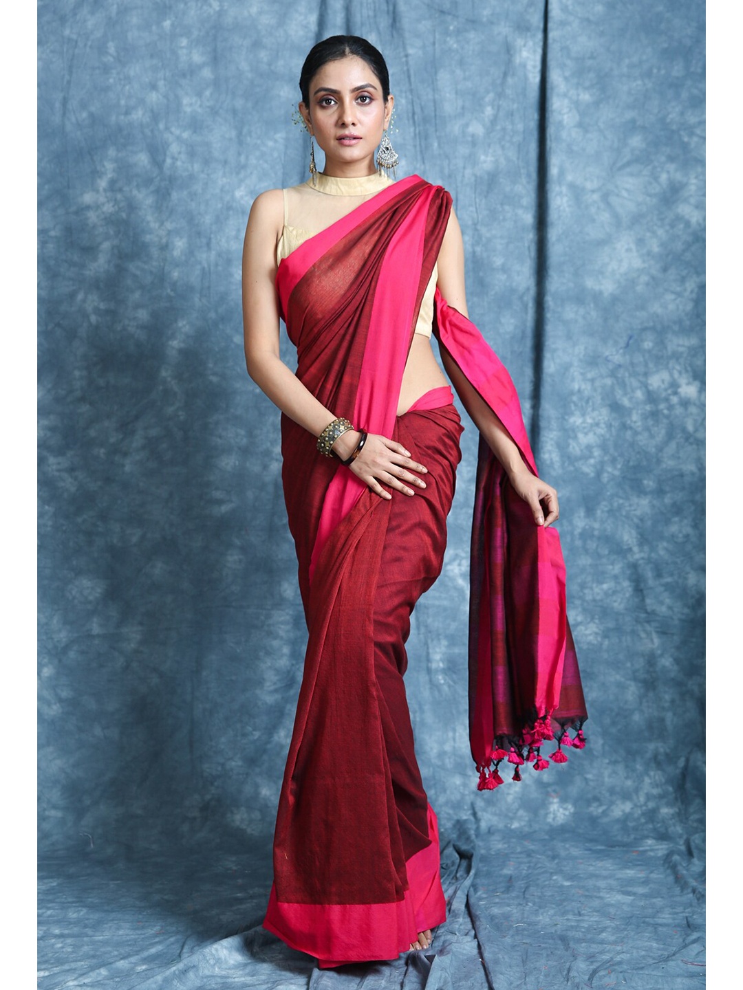 

Charukriti Maroon & Magenta Cotton Blend Saree