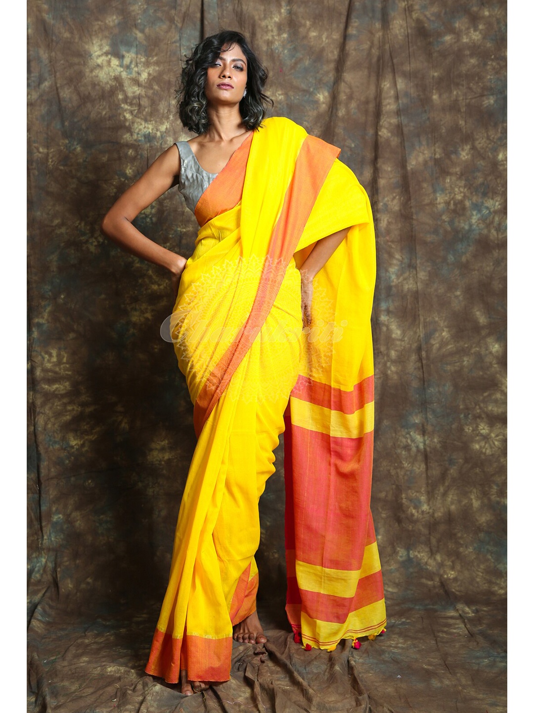 

Charukriti Yellow & Red Solid Cotton Handloom Saree