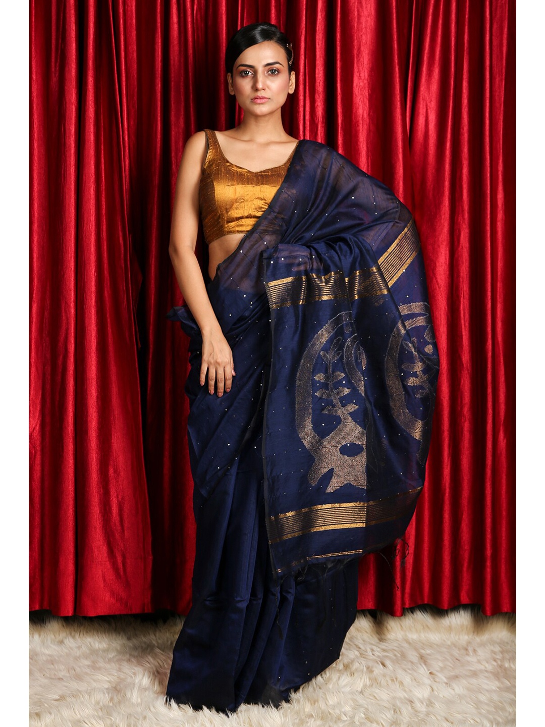 

Charukriti Blue & Gold-Toned Ethnic Motifs Sequinned Saree