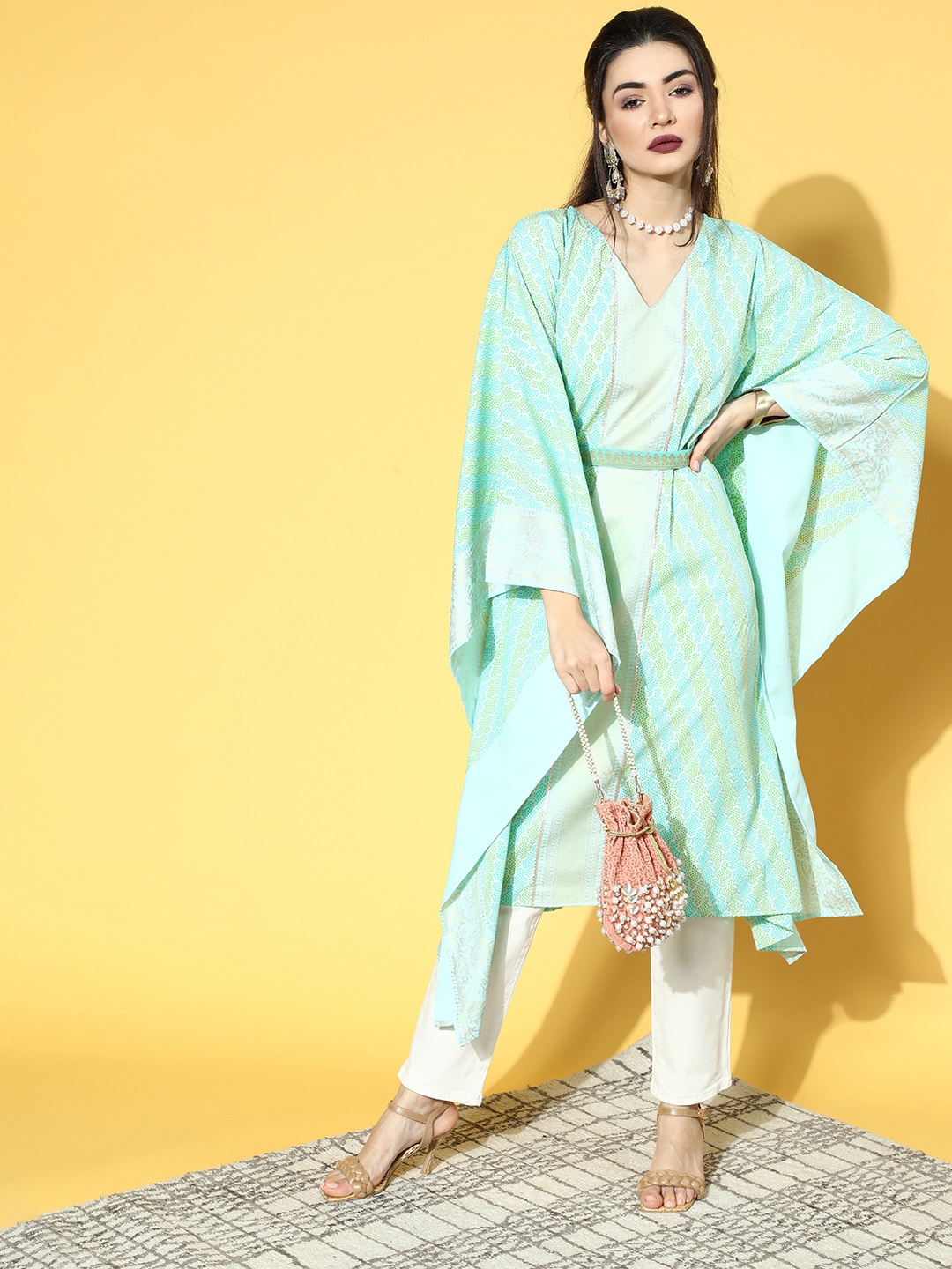 

Ahalyaa Enchanting Sea Green Crepe Kaftan Kurta