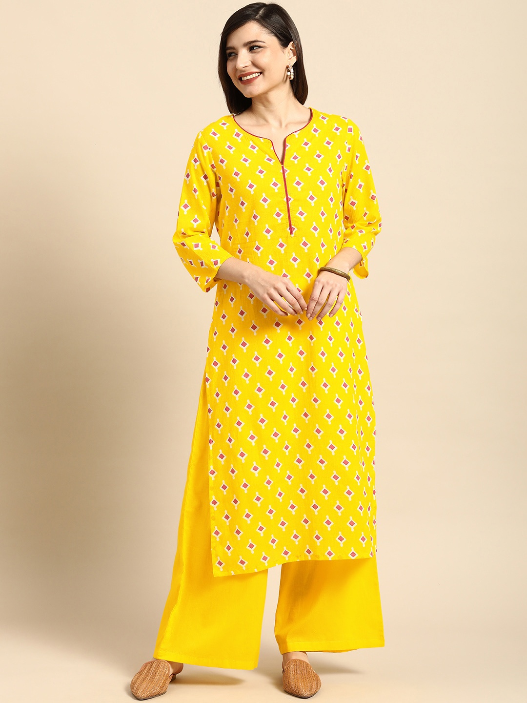 

Anouk Women Yellow Printed Pure Cotton Kurta with Palazzos