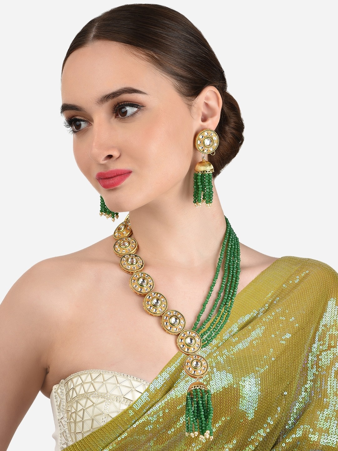 

Zaveri Pearls Gold-Plated Green Stone-Studded & Beaded Jewellery Set