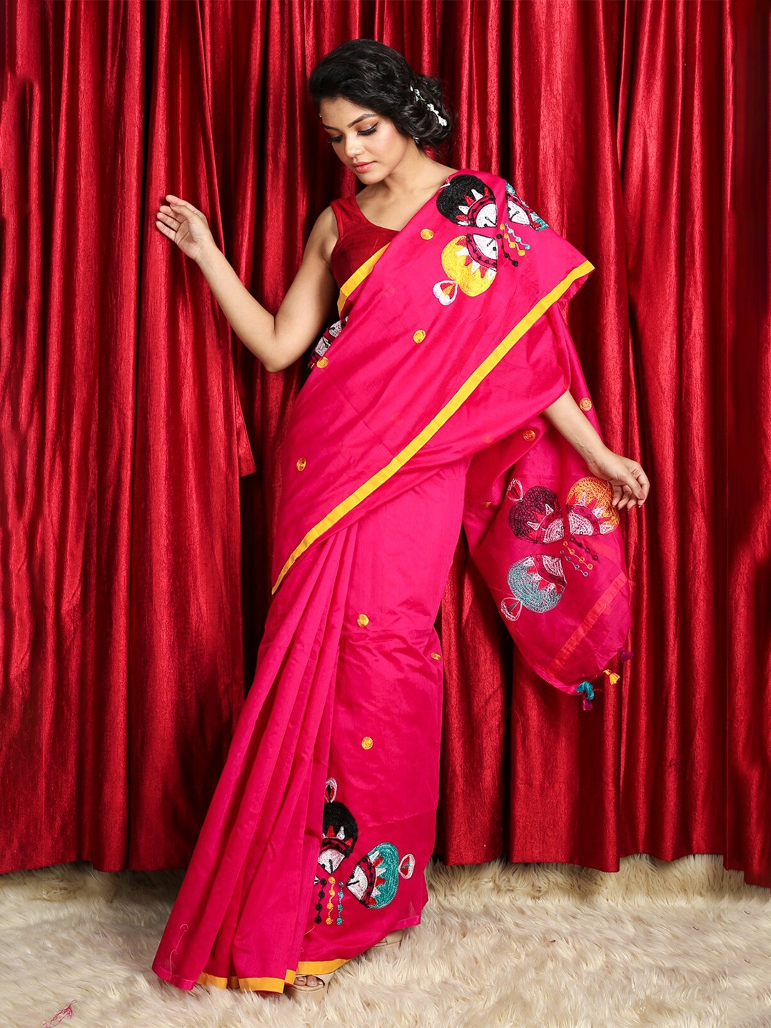 

Charukriti Magenta & Yellow Embroidered Saree