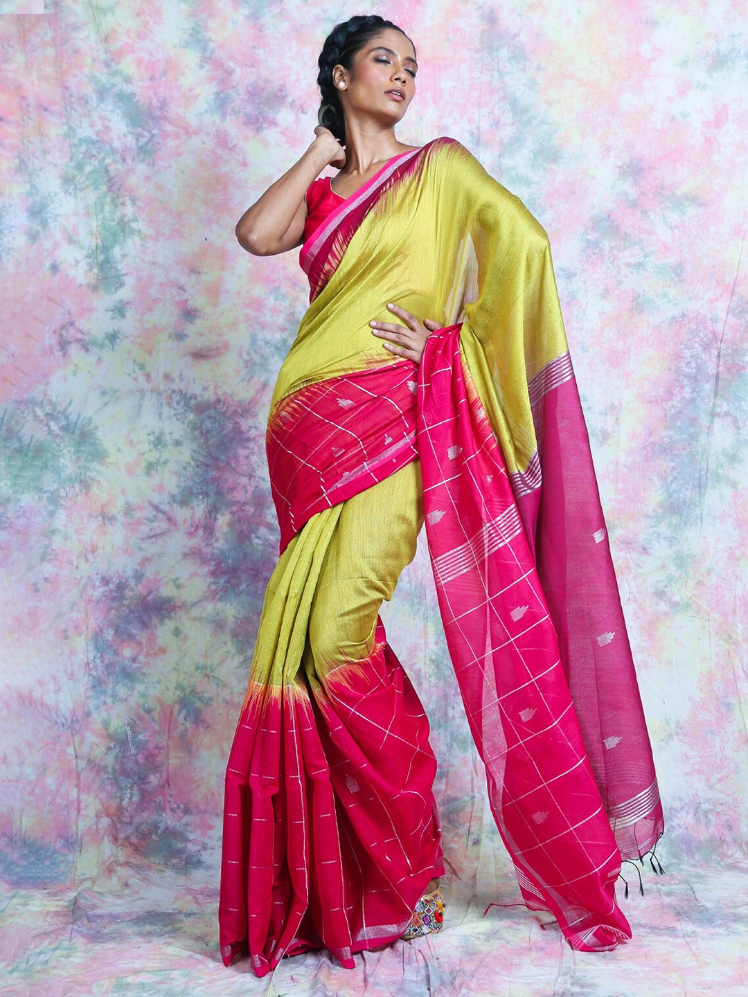 

Charukriti Yellow & Pink Solid Cotton Blend Handloom Saree