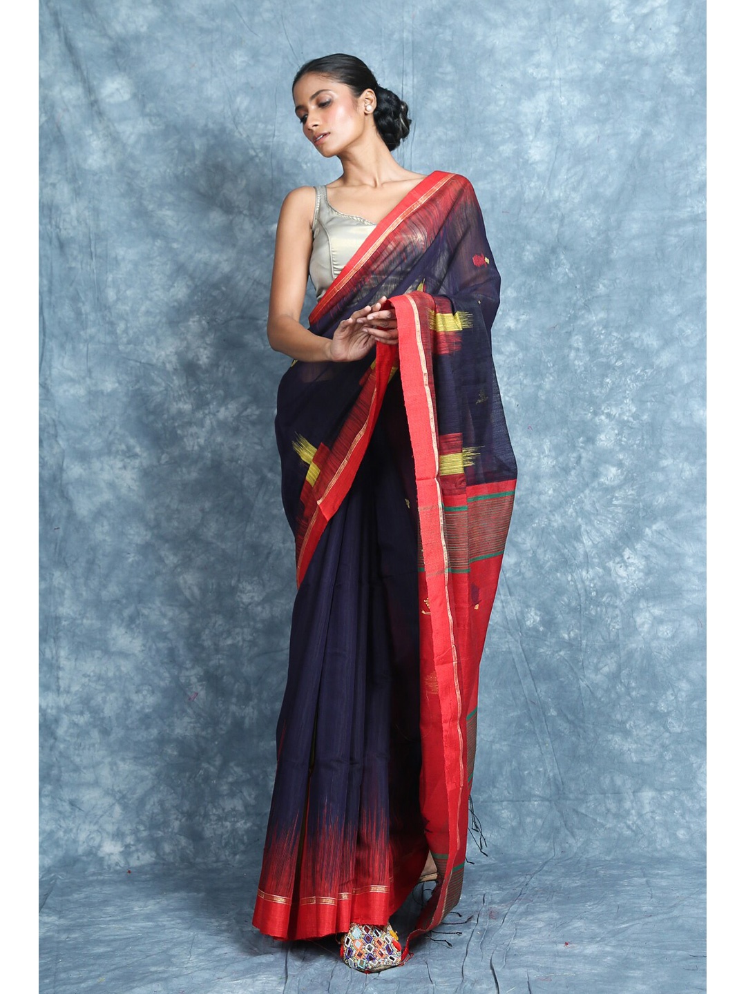 

Charukriti Navy Blue & Red Ethnic Motifs Ikkat Saree