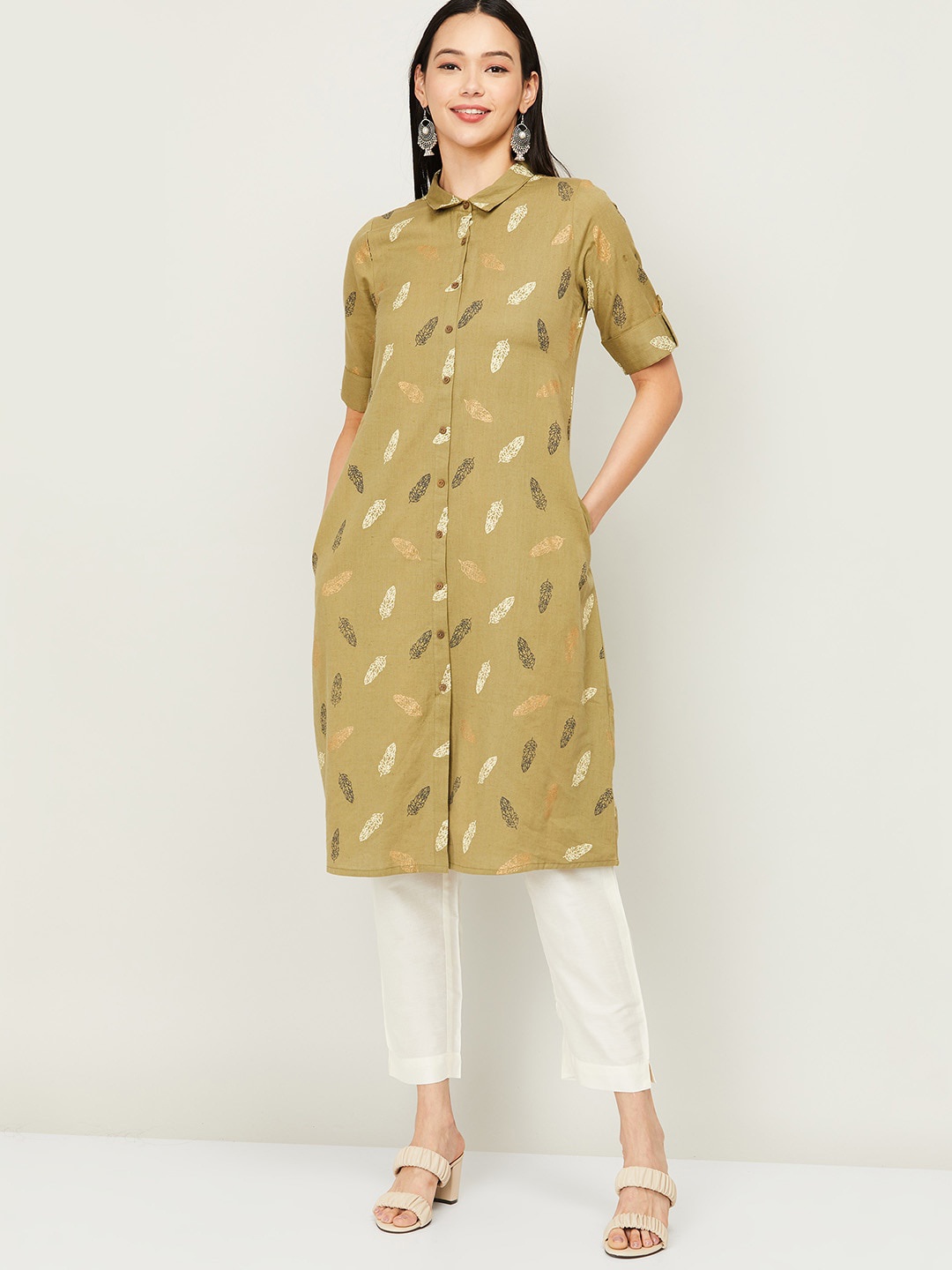 

Colour Me by Melange Women Green & Black Printed Cotton Tunics