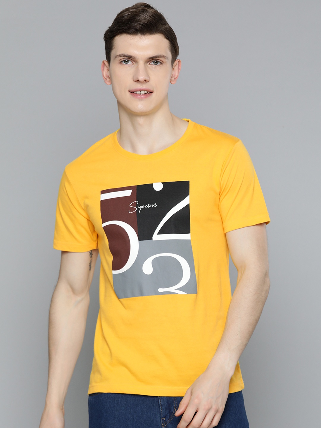 

HERE&NOW Men Yellow Typography Printed T-shirt