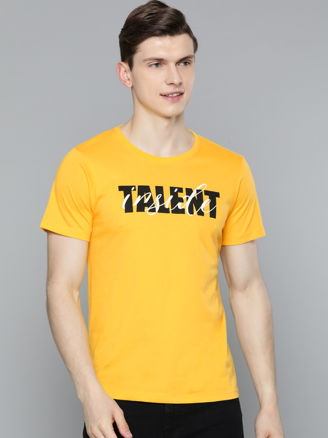 

HERE&NOW Men Yellow & Black Typography Printed T-shirt