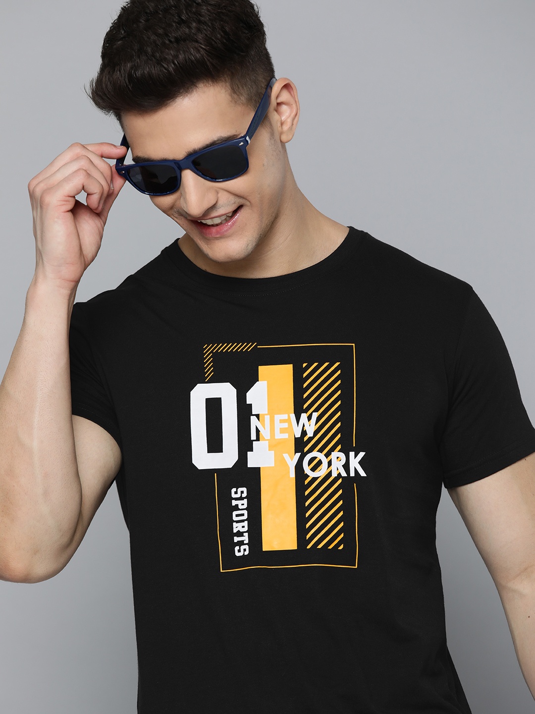 

HERE&NOW Men Black & Yellow Typography Printed T-shirt