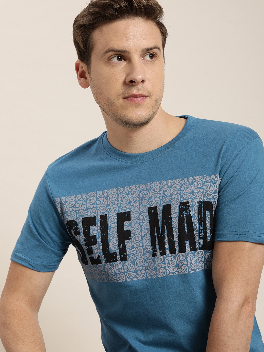 

Moda Rapido Men Blue & Black Typography Printed Pure Cotton T-shirt