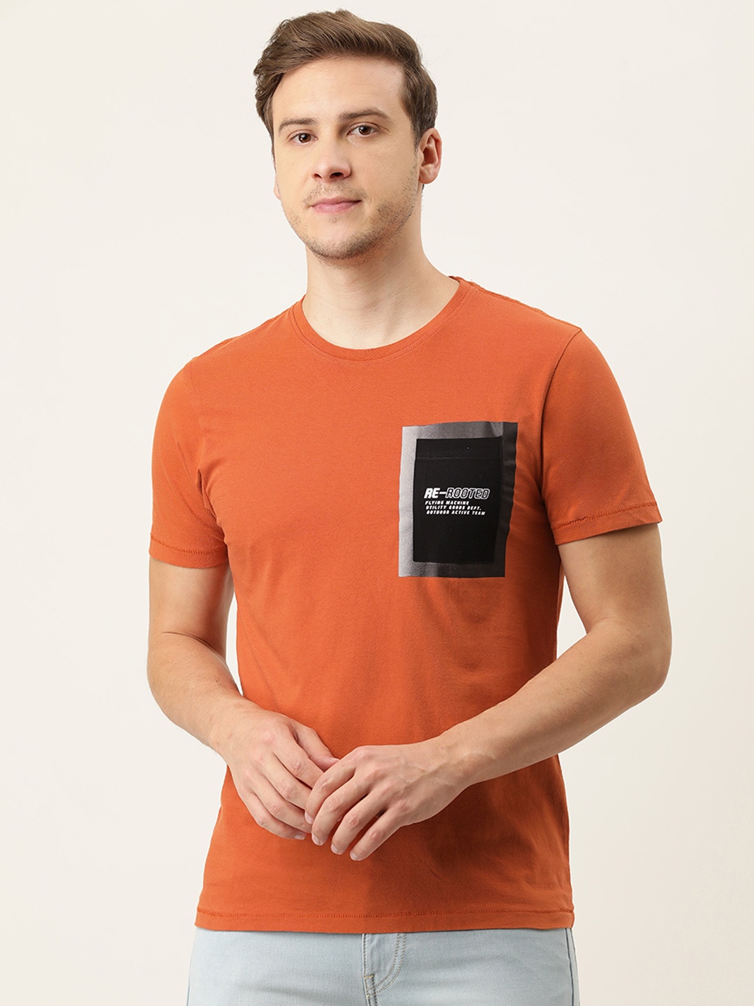 

Flying Machine Men Orange & Black Solid Pure Cotton Slim Fit T-shirt