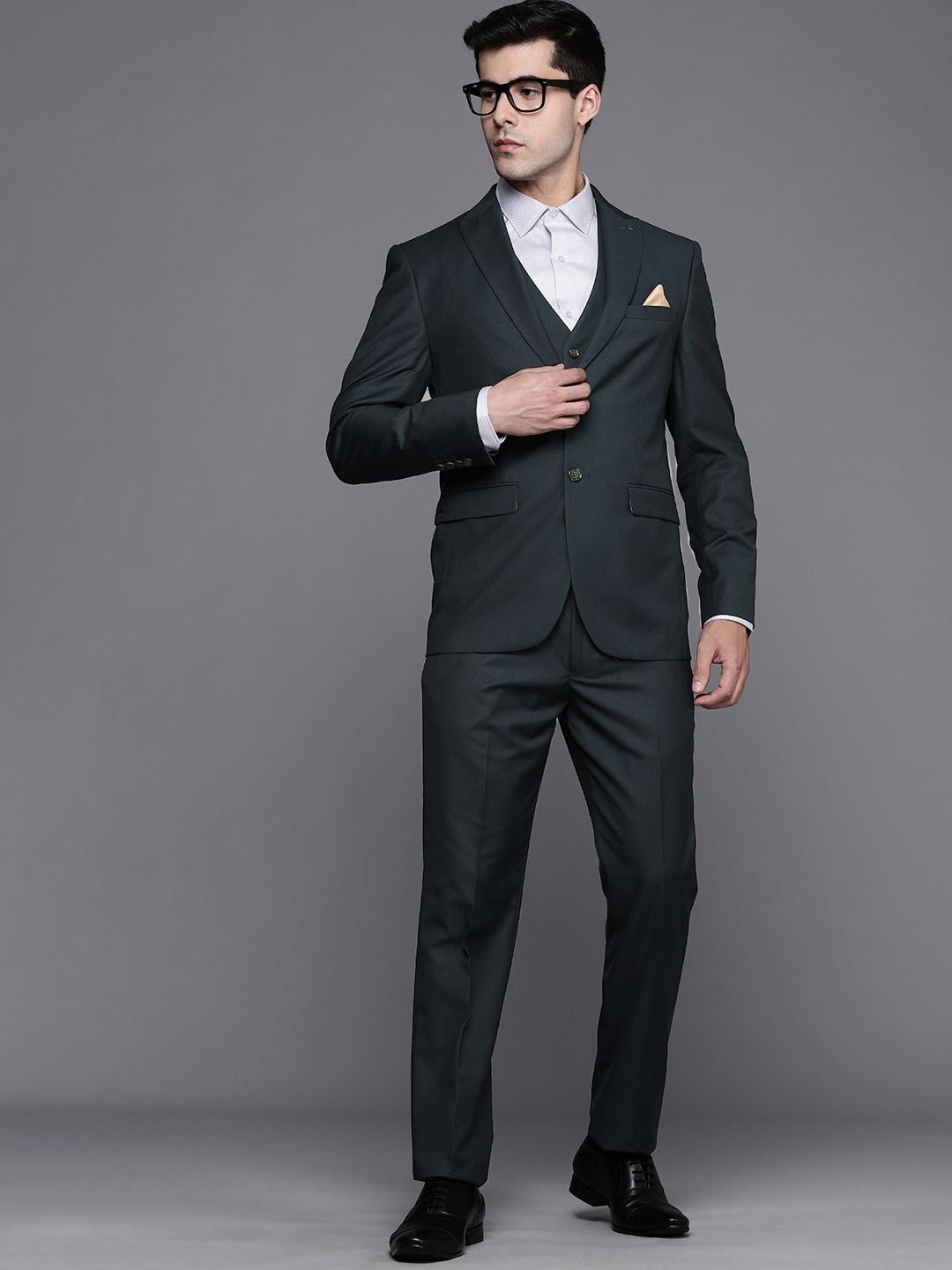 

Louis Philippe Men Teal Green Solid Slim Fit Single-Breasted 3 Piece Formal Suit