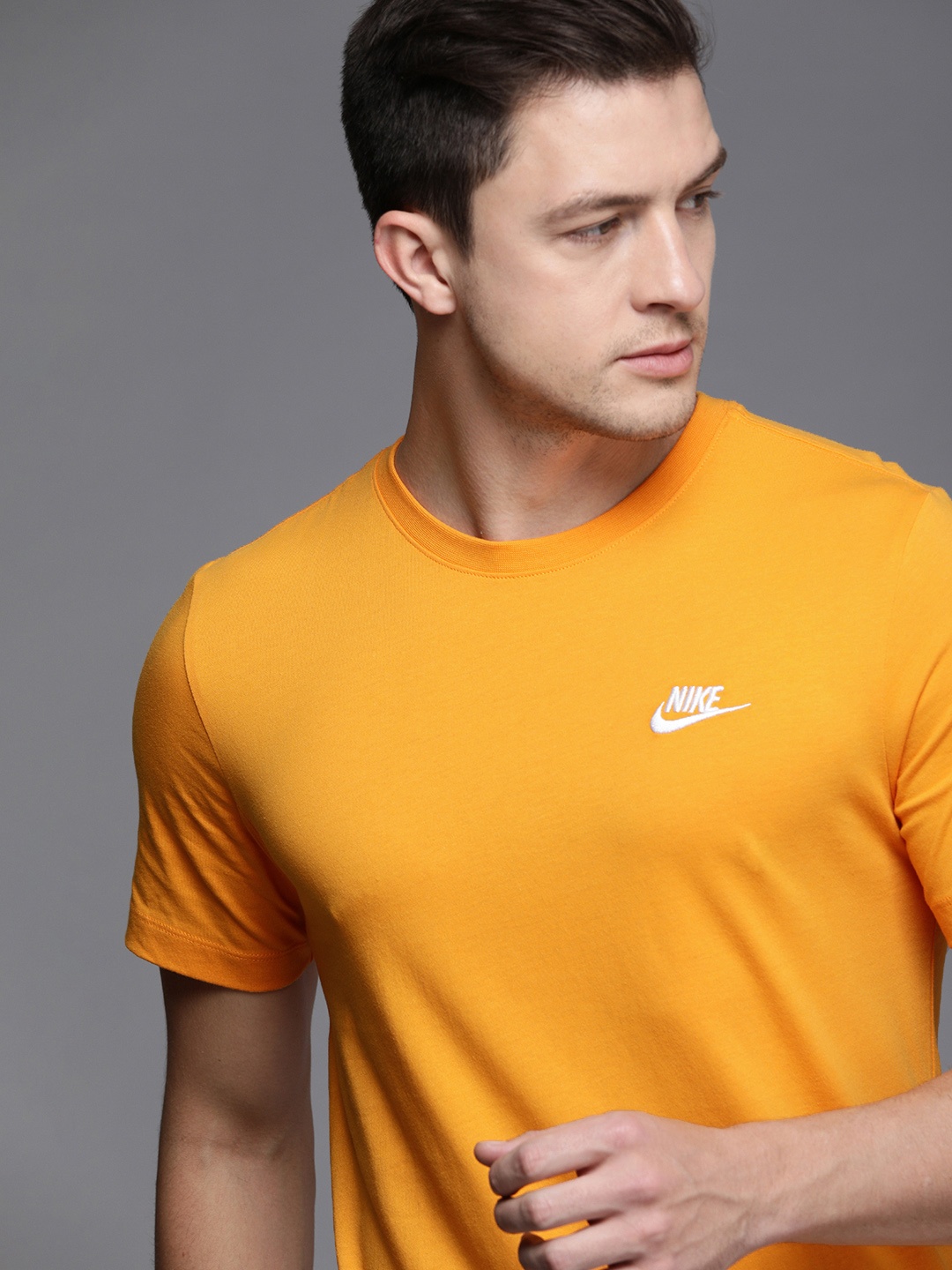 

Nike Men Orange Brand Logo Printed T-shirt