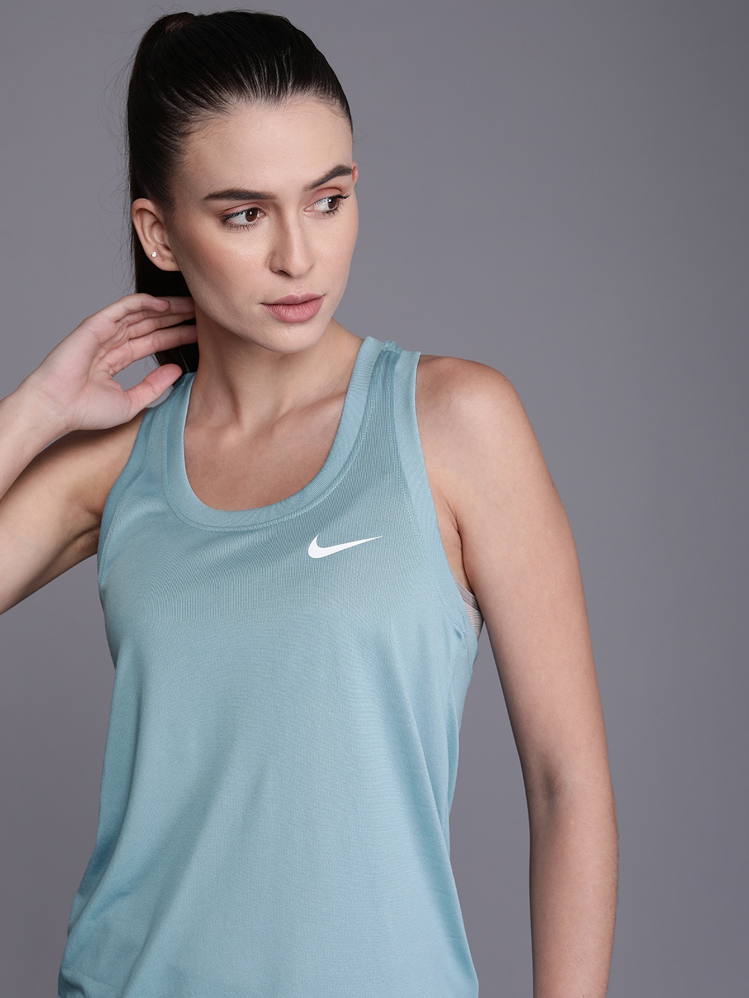 

Nike Women Light Blue Solid Dri-FIT Racerback Sleeveless Tank Top