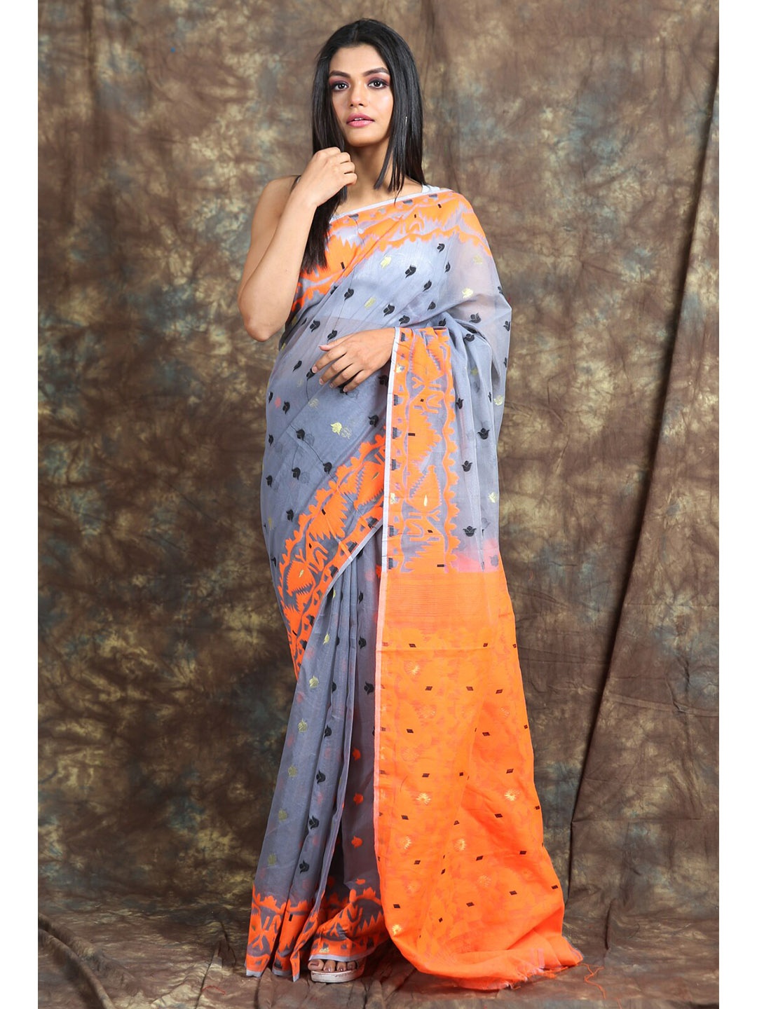 

Charukriti Grey & Orange Abstract Printed Silk Cotton Jamdani Saree