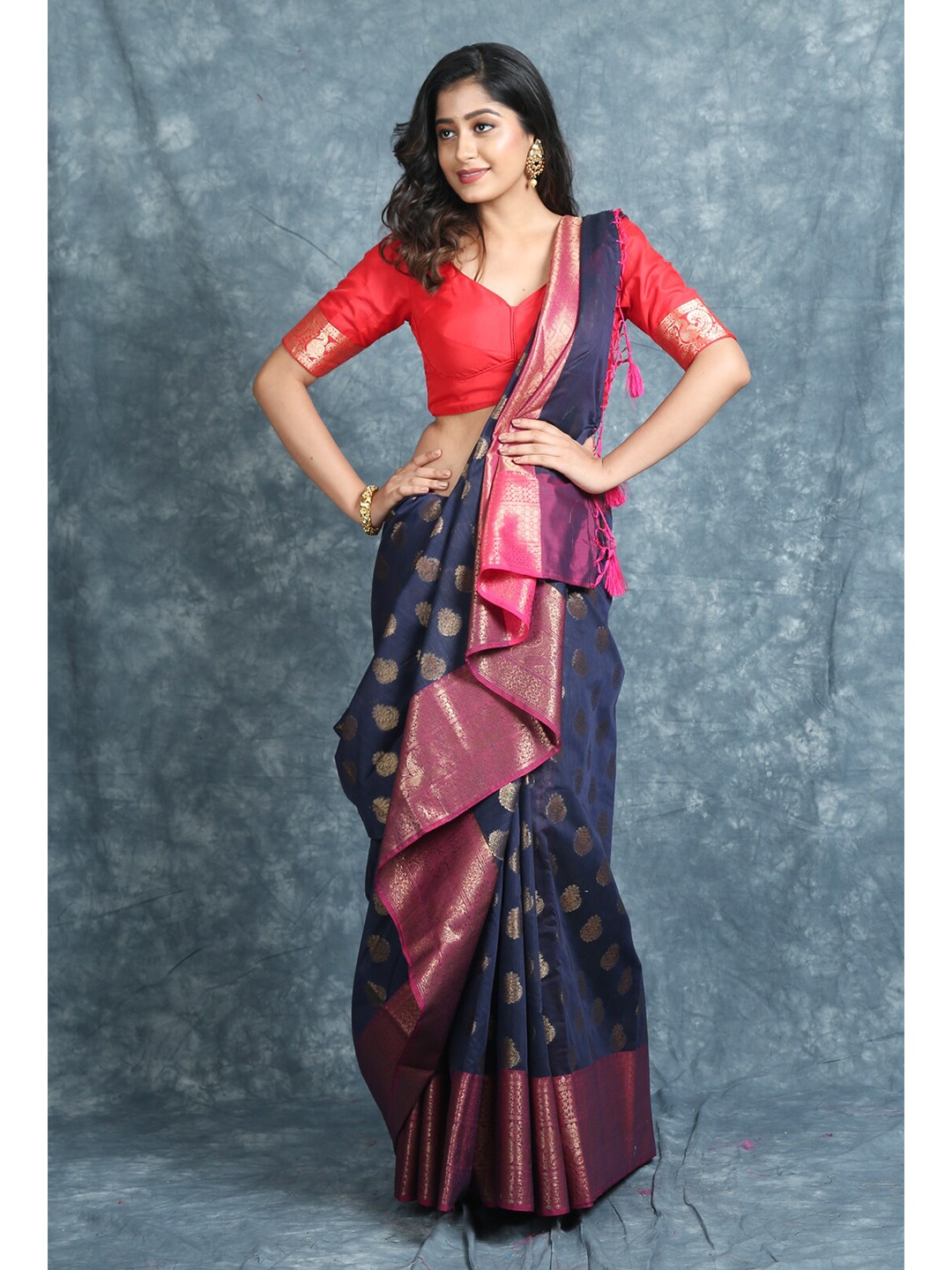 

Charukriti Blue & Pink Woven Design Zari Saree