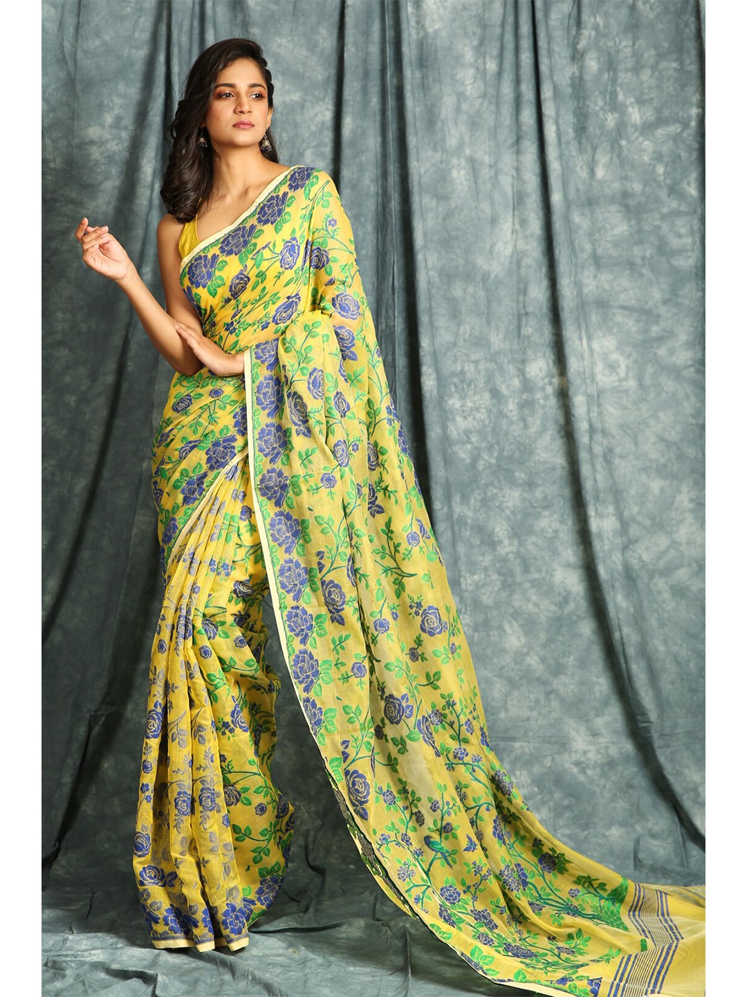 

Charukriti Yellow & Blue Woven Design Silk Cotton Jamdani Saree