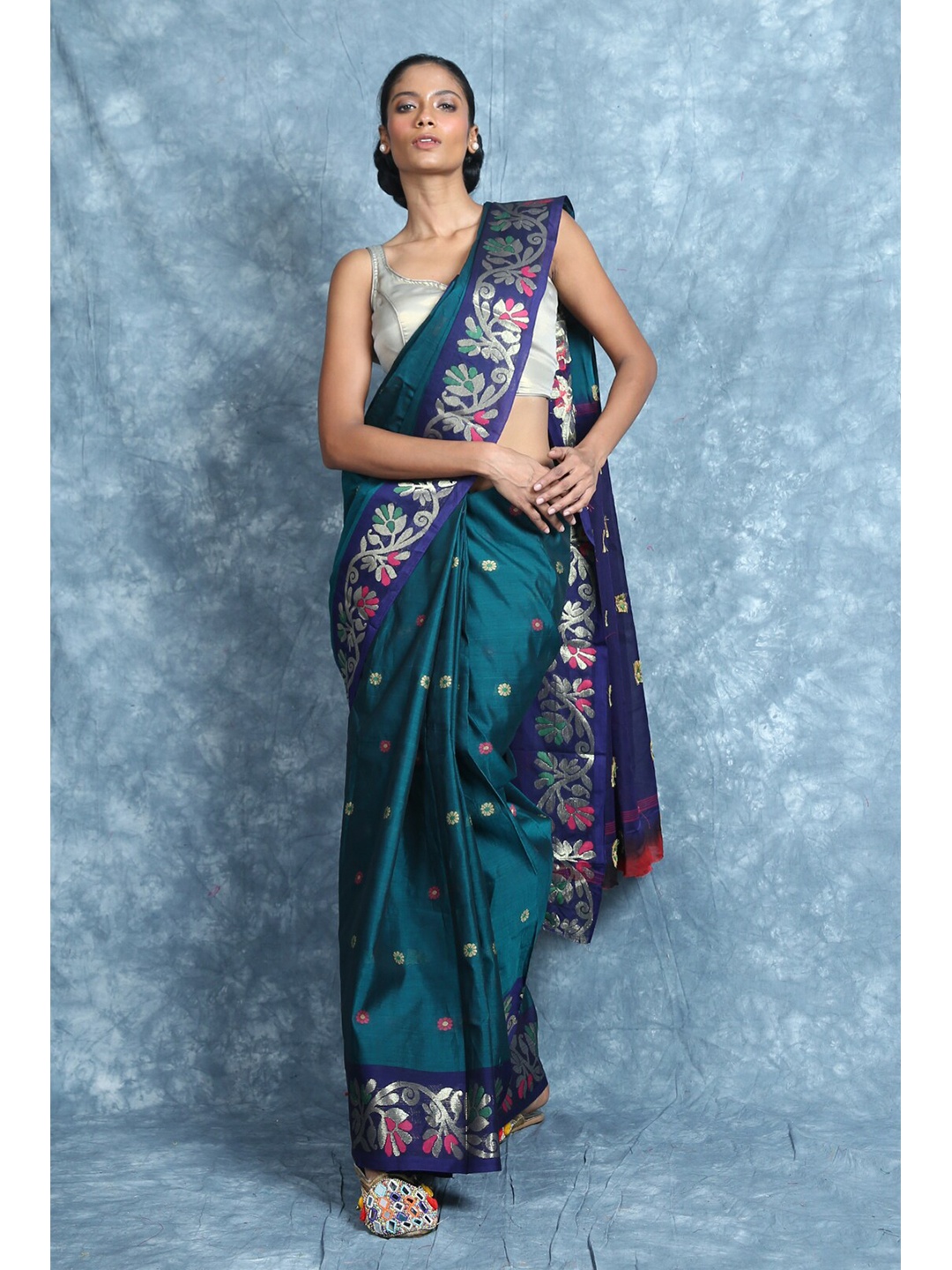

Charukriti Teal & Green Woven Design Zari Pure Cotton Saree