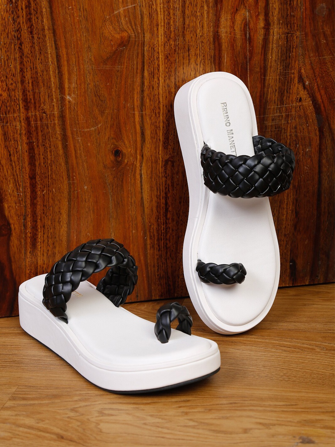 

Bruno Manetti Women White & Black One Toe Heels