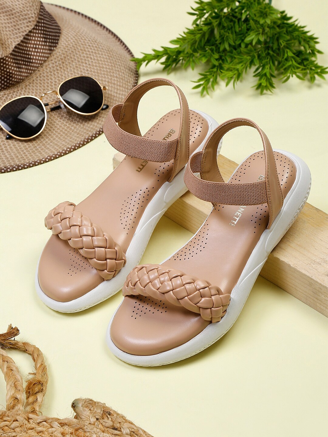 

Bruno Manetti Women Tan Textured PU Platform Heels Sandals