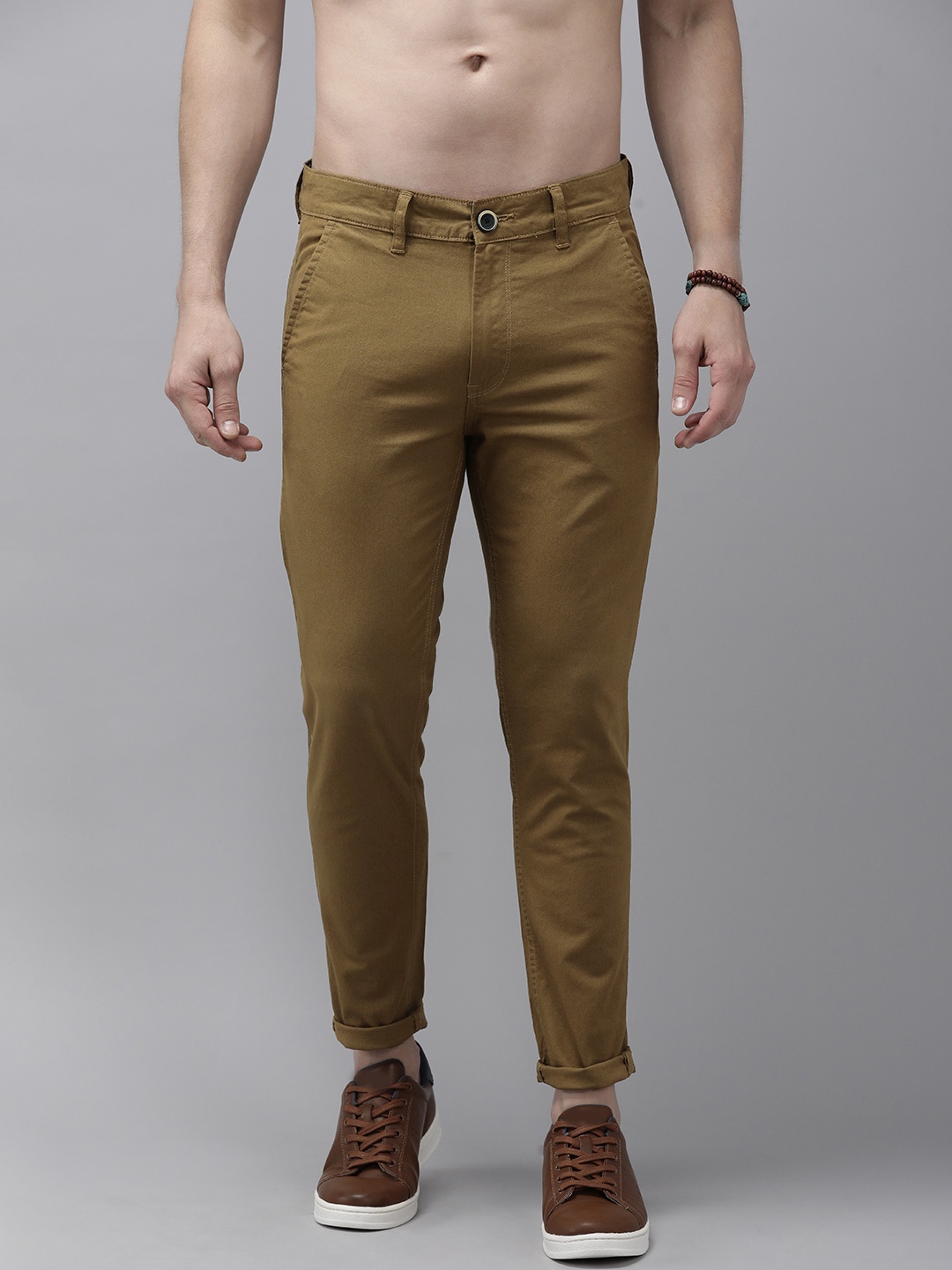 

The Roadster Lifestyle Co Men Brown Solid Slim Tapered Fit Trousers