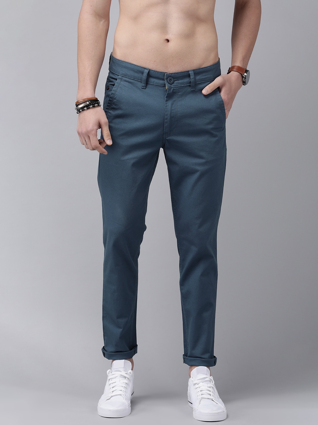 

Roadster Men Blue Solid Mid-Rise Regular Trousers