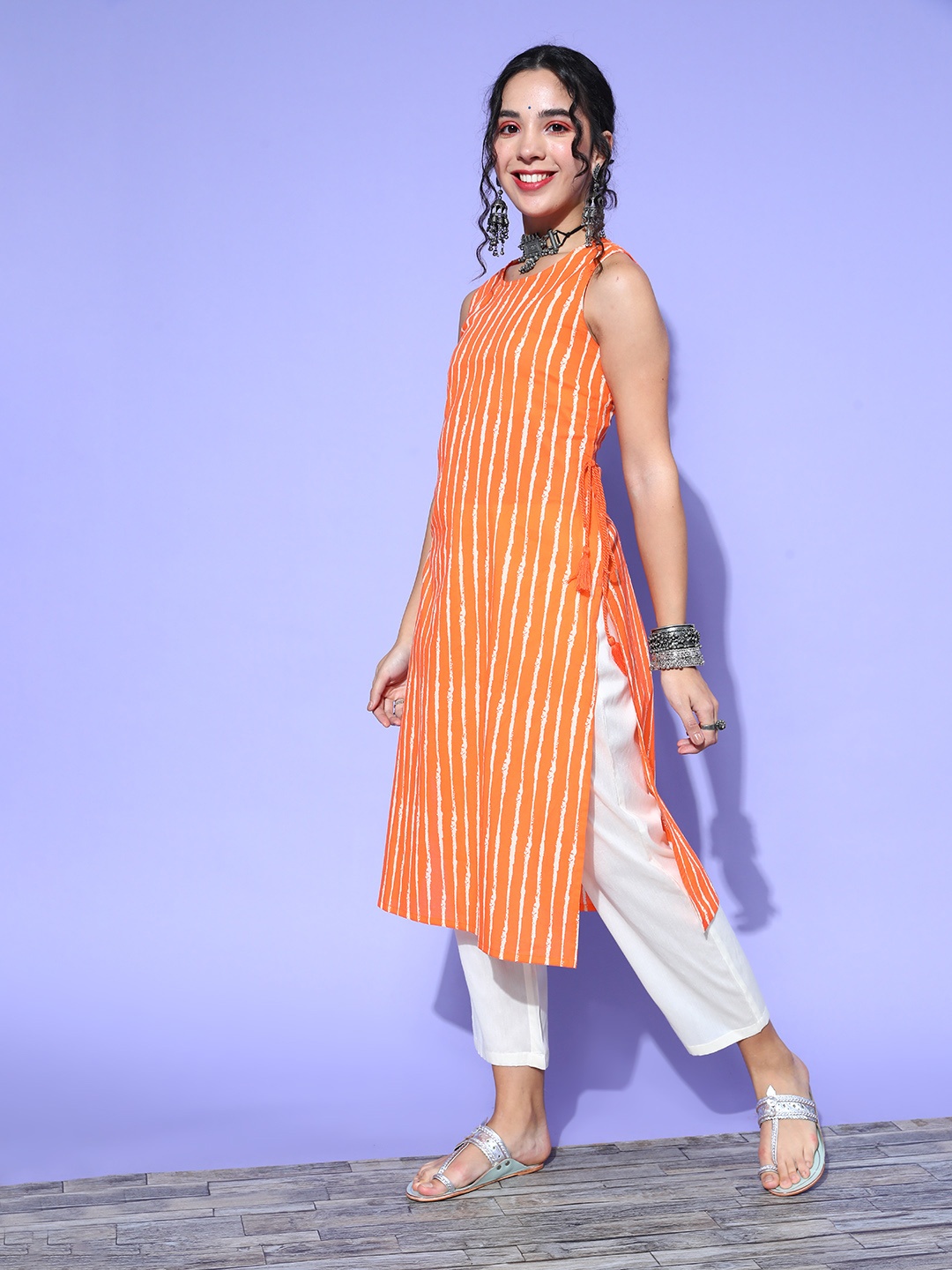 

Moda Rapido Women Orange & Off White Striped Pure Cotton Kurta