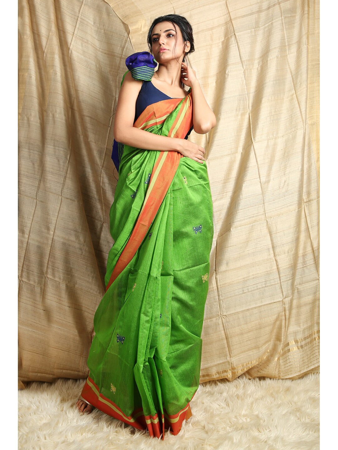 

Charukriti Fluorescent Green & Navy Blue Woven Design Pure Cotton Saree