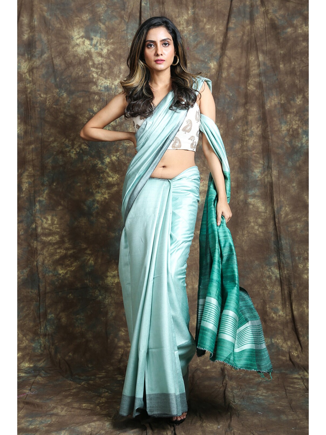 

Charukriti Teal Woven Design Pure Cotton Saree