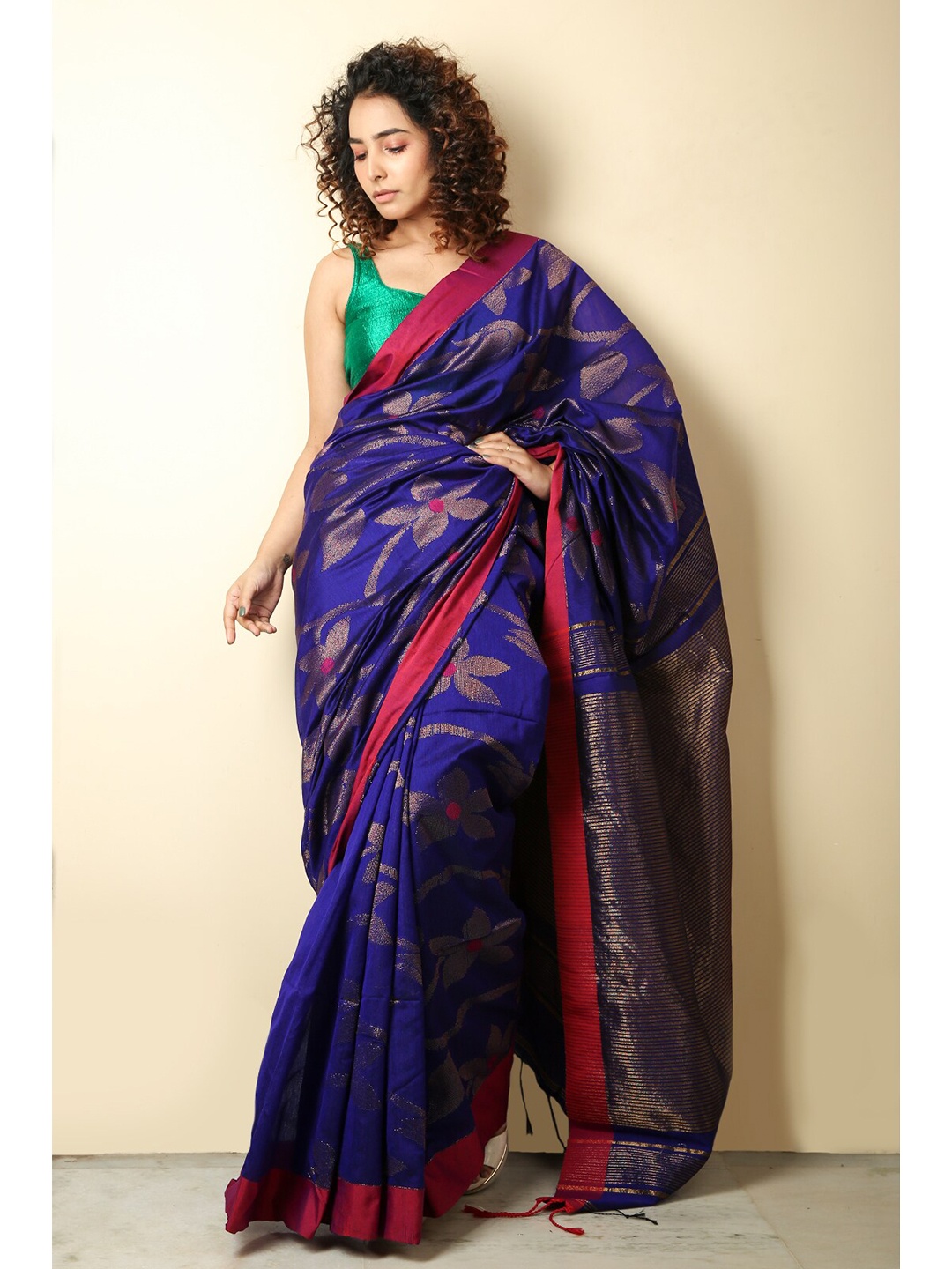 

Charukriti Blue & Magenta Floral Zari Saree