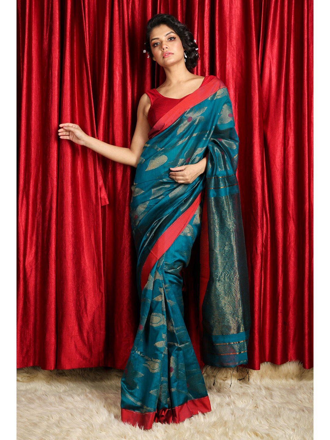 

Charukriti Blue & Red Woven Design Saree