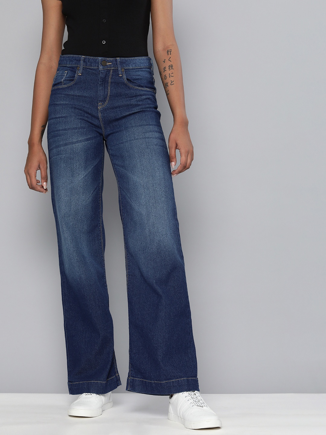 

HERE&NOW Women Blue Flared Mid-Rise Heavy Fade Stretchable Jeans