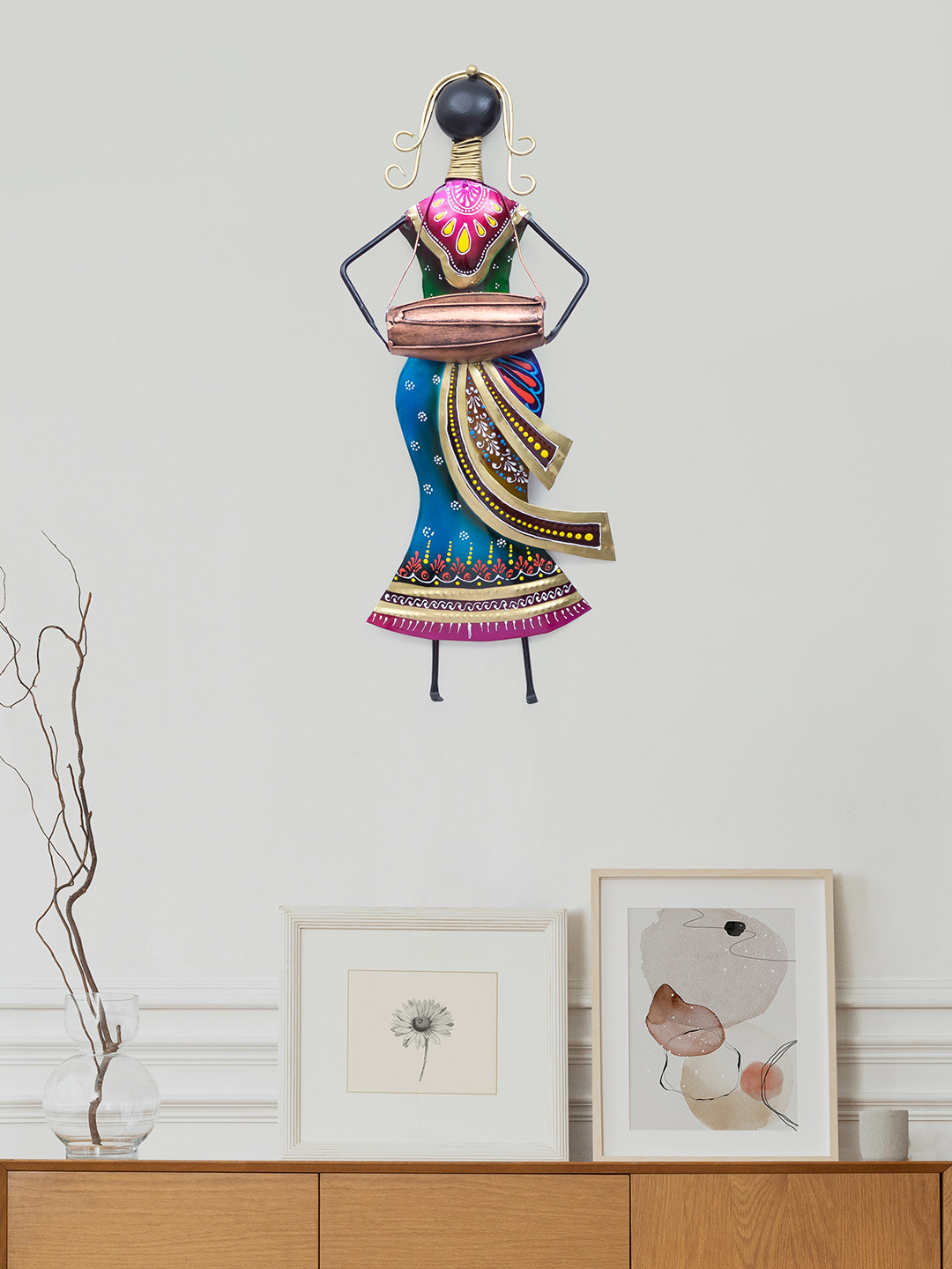 

Golden Peacock Pink & Blue Lady Playing Dholak Wall Decor