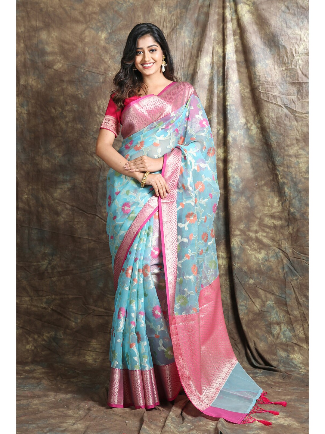 

Charukriti Blue & Pink Floral Zari Organza Saree