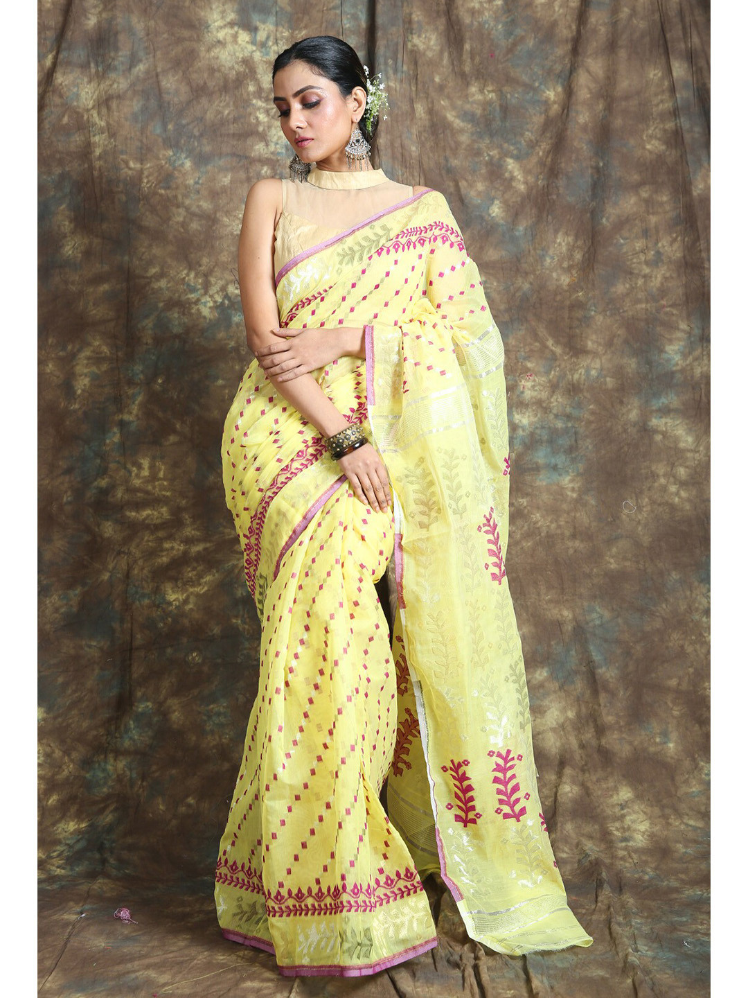 

Charukriti Yellow & Fuchsia Ethnic Motifs Zari Silk Cotton Jamdani Saree