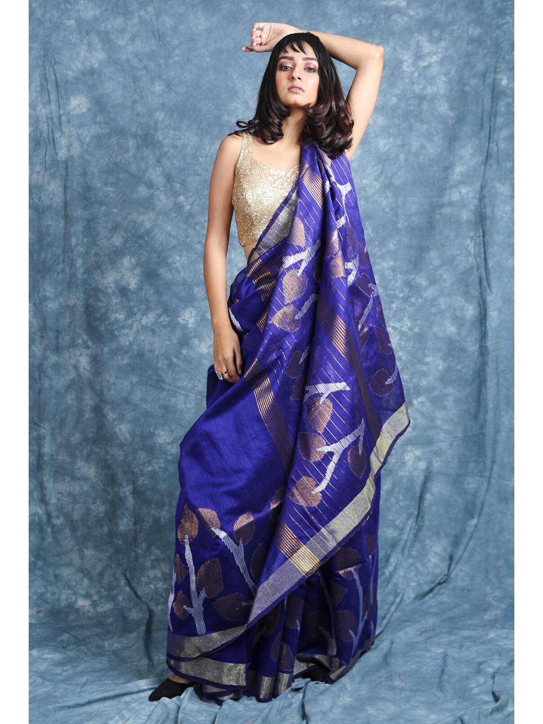 

Charukriti Blue & Silver-Toned Woven Design Saree
